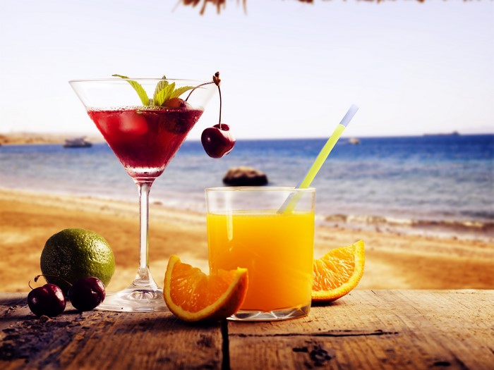 Drinks on the beach with sea background