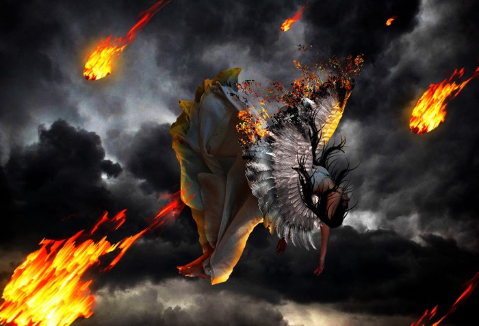 Angel falling amidst fire and dark clouds