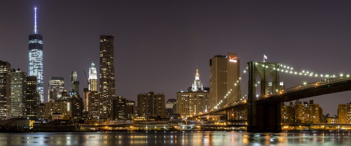 New York City Skyline and Brooklyn Bridge at Night