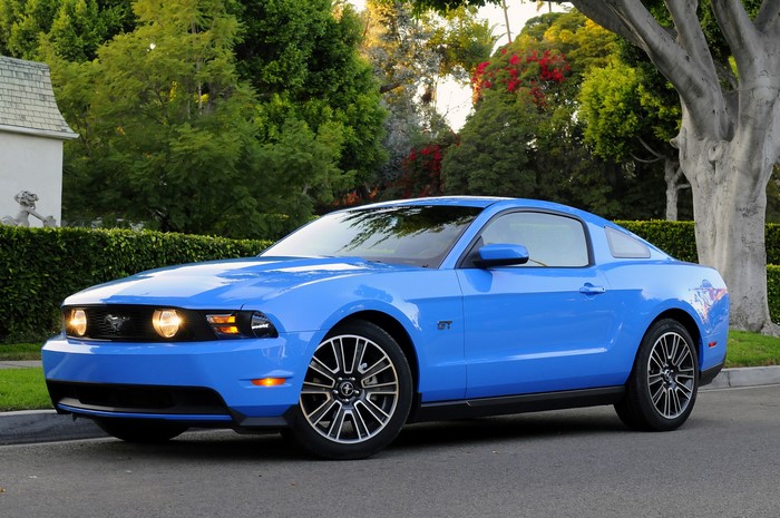 Blue 2010 Ford Mustang GT parked on street