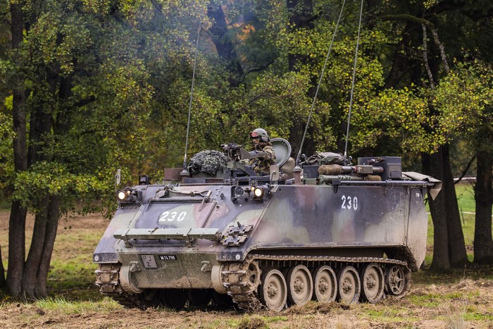 M113 Kdo Pz 63 APC in a forest