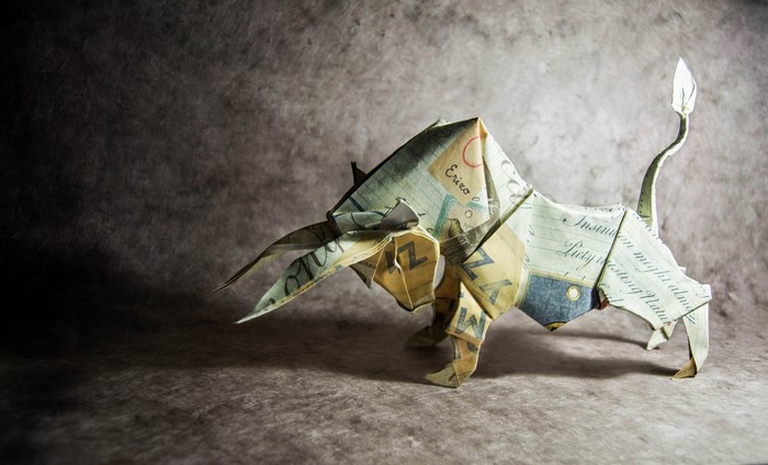 Origami bull made from paper money