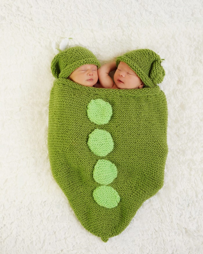 Two Newborn Babies Dressed as Peas in a Pod