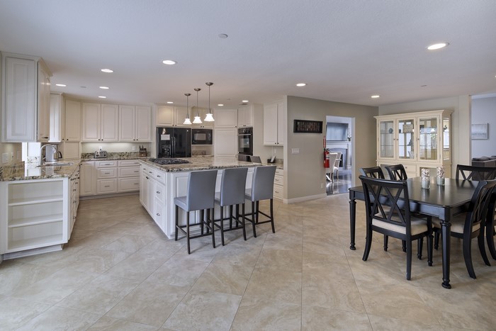 Kitchen and Dining Area with Island and Table
