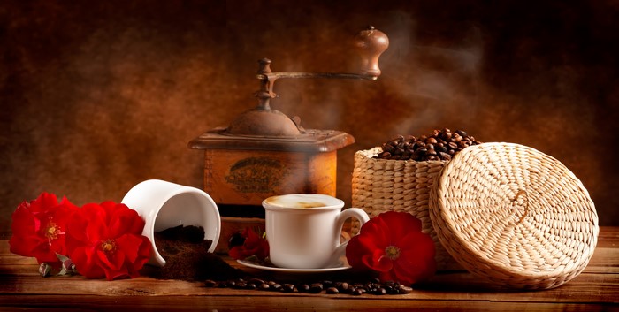 Steaming Coffee with Roses and Vintage Coffee Mill