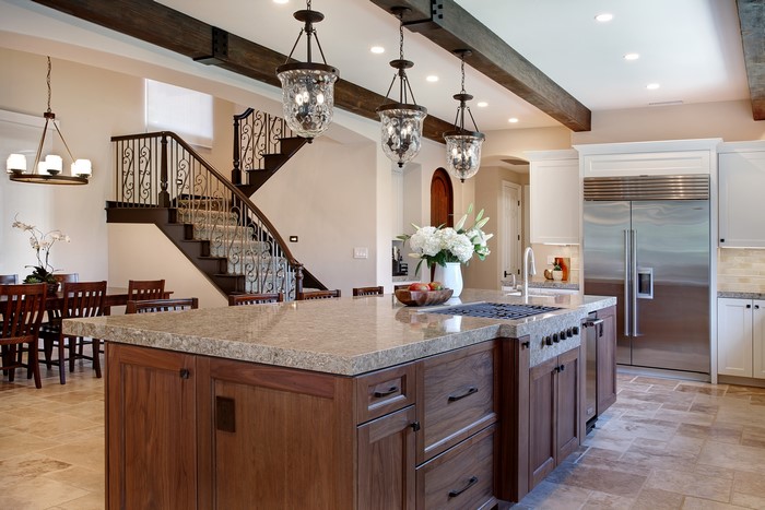 Kitchen with Island, Dining Area, and Stairs