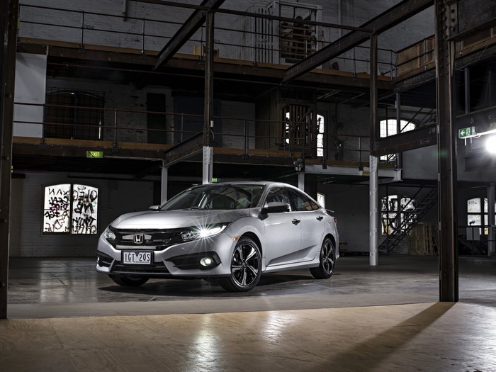 Silver 2016 Honda Civic Sedan RS in warehouse