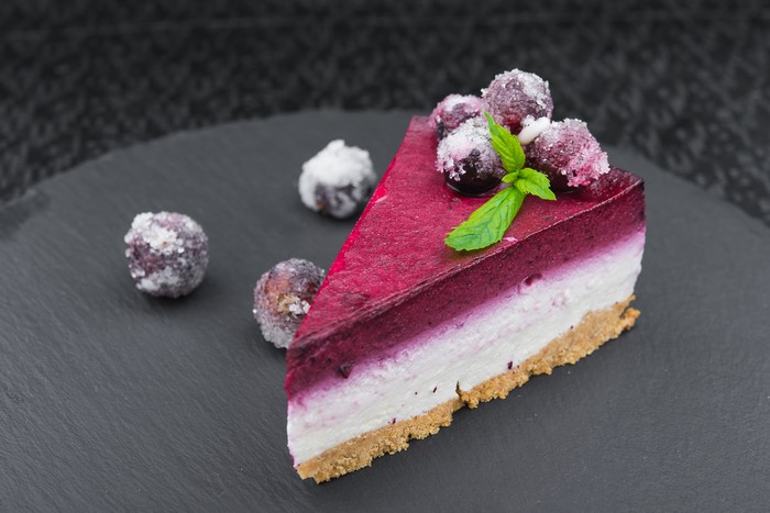 Slice of Berry Cheesecake with Candied Berries