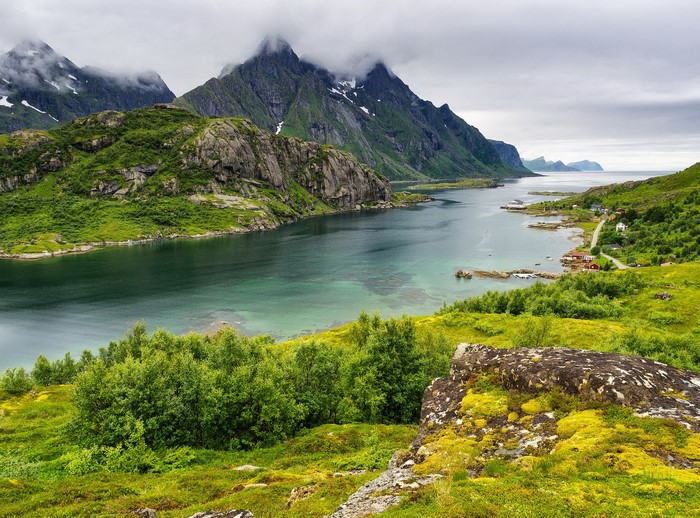 Fjord with Mountains and Houses in Norway