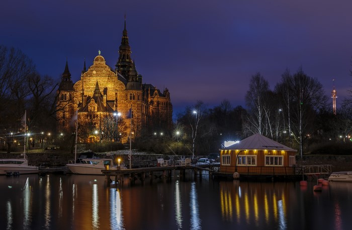 Stockholm Sweden Nighttime Riverfront with Museum and Floating House