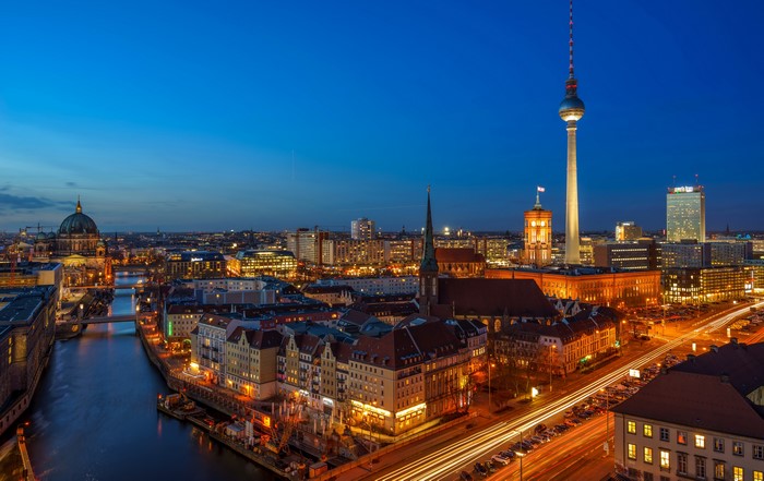 Berlin skyline with TV Tower and Spree River at night