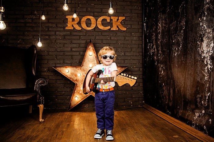 Boy with Guitar and Sunglasses