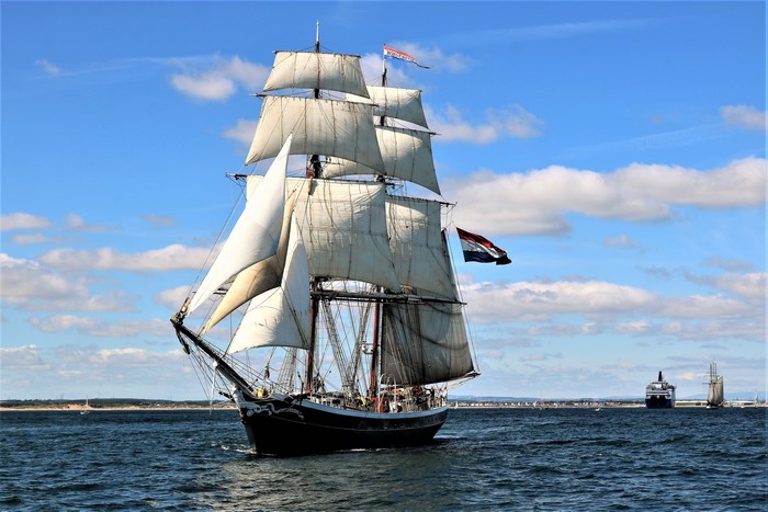 Tall ship sailing on the sea with Dutch flag