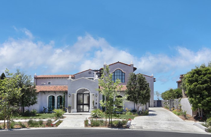 Luxury Mediterranean-style house with a driveway