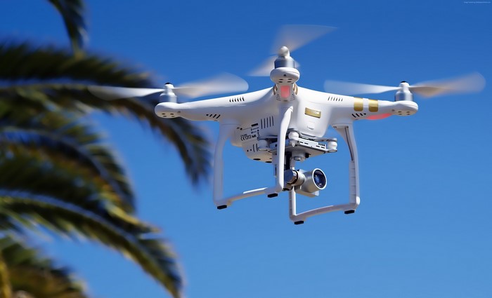 DJI Phantom 3 Quadcopter Drone in Flight