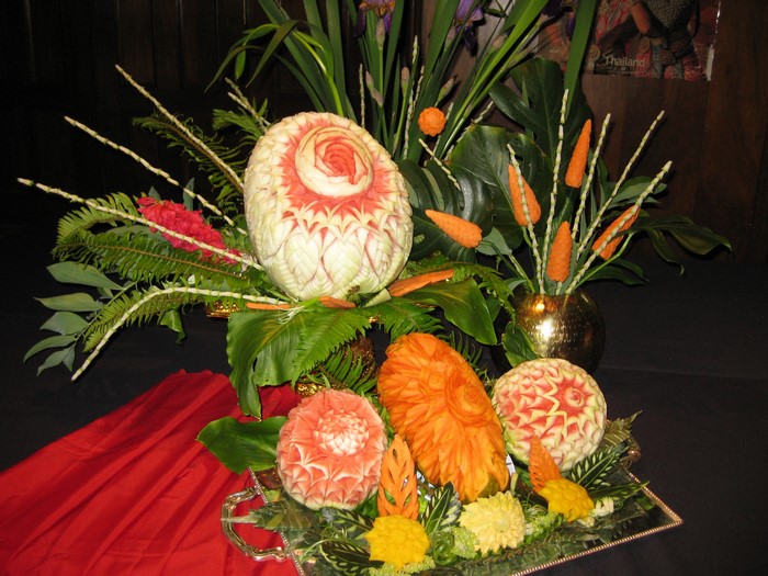 Carved fruits and vegetables arrangement