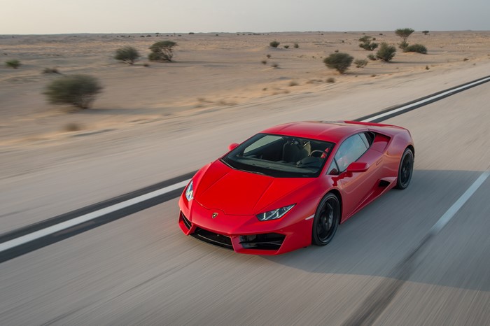 Red Lamborghini Huracan LP 580-2 on a Desert Road
