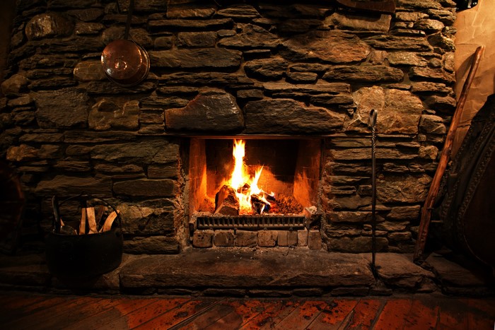 Stone Fireplace with Burning Fire