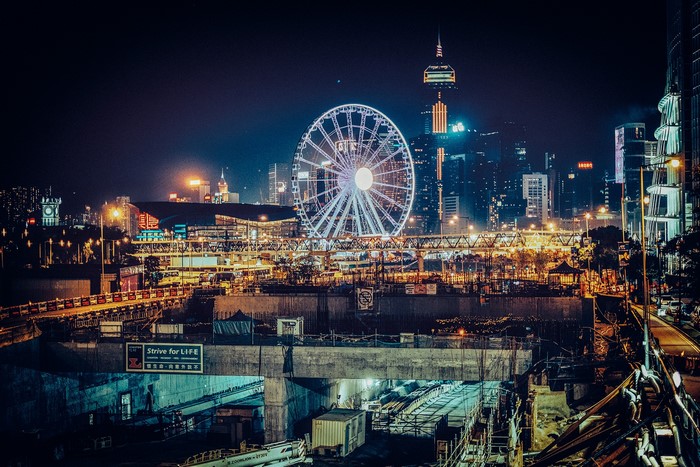 Hong Kong skyline with Ferris wheel at night