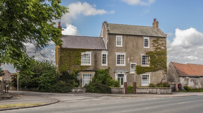 Two houses on a street in Edlington, South Yorkshire, United Kingdom