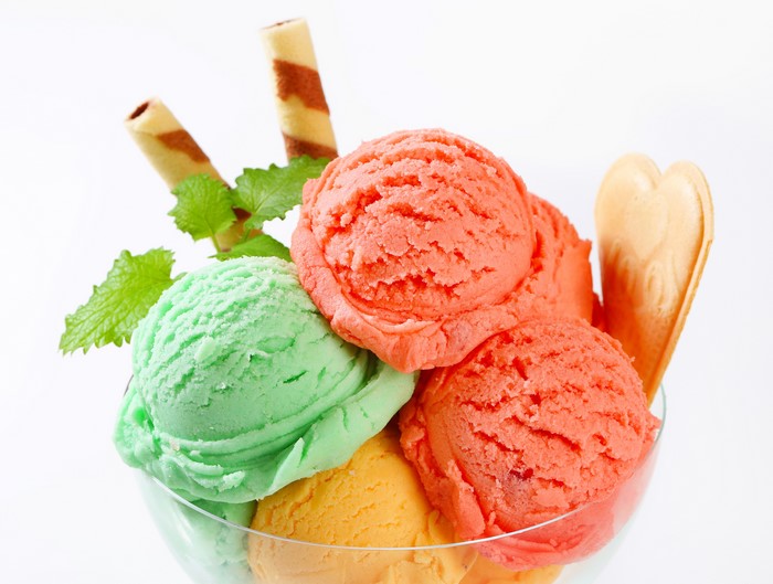 Ice cream sundae with wafer cookies and mint