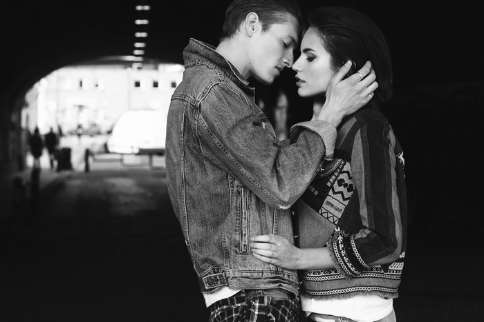 Couple in love wearing denim jackets