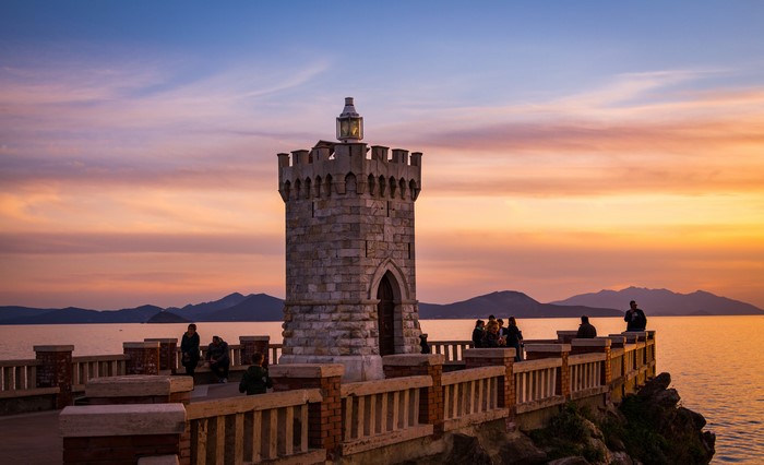 Lighthouse at Piombino, Tuscany, Italy during sunset