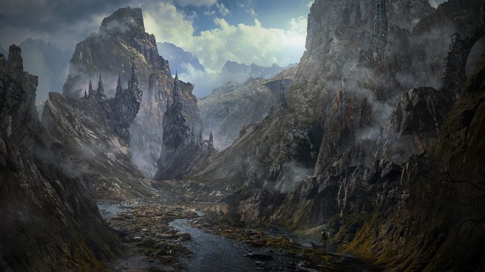 Fantasy mountains with castles and a lone traveler