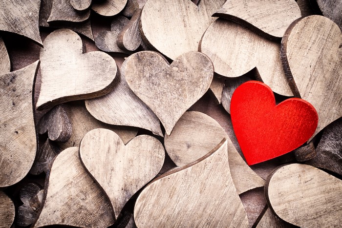 Wooden Hearts with One Red Heart