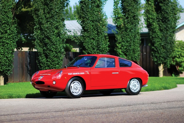 Red Fiat Abarth 1000 GT Bialbero parked on a street