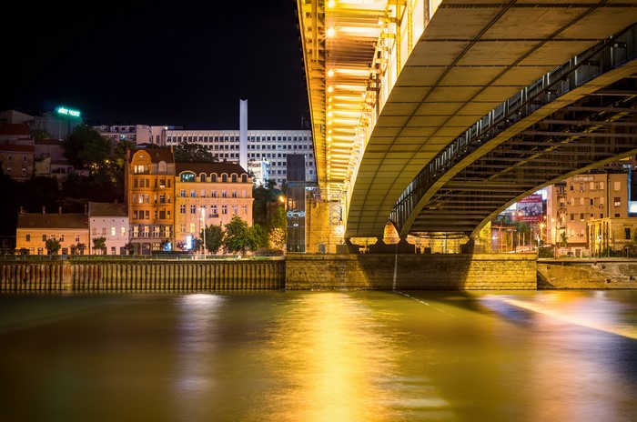 Night view of a bridge over a river in Belgrade, Serbia