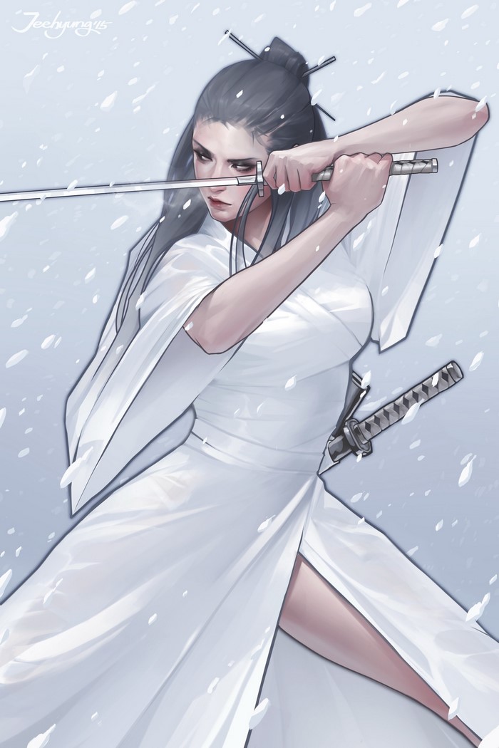 Woman in white kimono with sword in snow