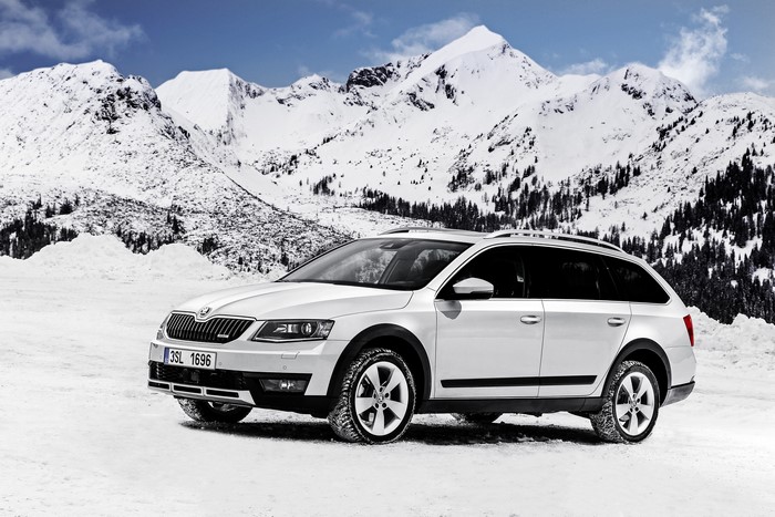 White Skoda Octavia Estate Car in Snow