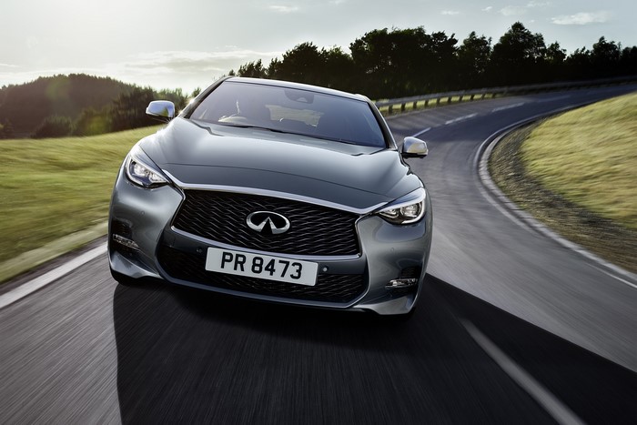 Infiniti Q30S Crossover driving on a road