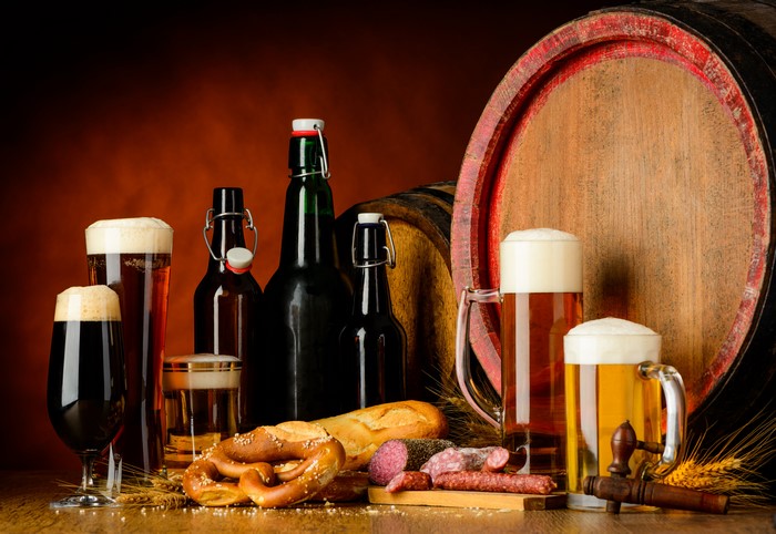 Beer Barrel with Bottles, Glasses, Sausage, and Bread