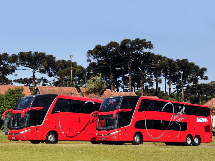Two red Scania double-decker buses