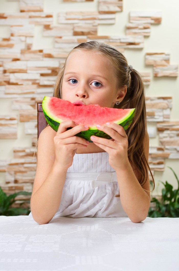 Girl eating watermelon