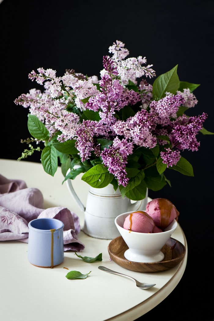 Still-life of lilac bouquet and ice cream