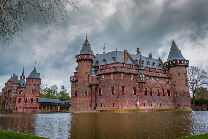 De Haar Castle in Netherlands over a pond