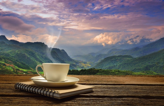 4K Scenic Coffee Cup with Mountain View