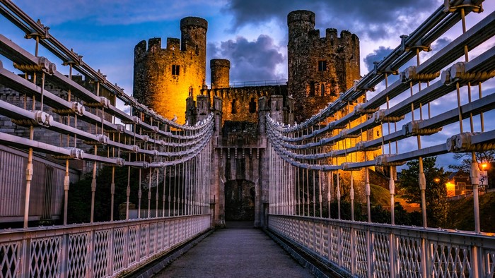 Conwy Castle and Suspension Bridge in Wales at Dusk