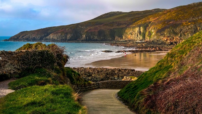 Coastal path leading to a beach in Wales, United Kingdom