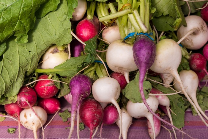 Radishes with green leaves
