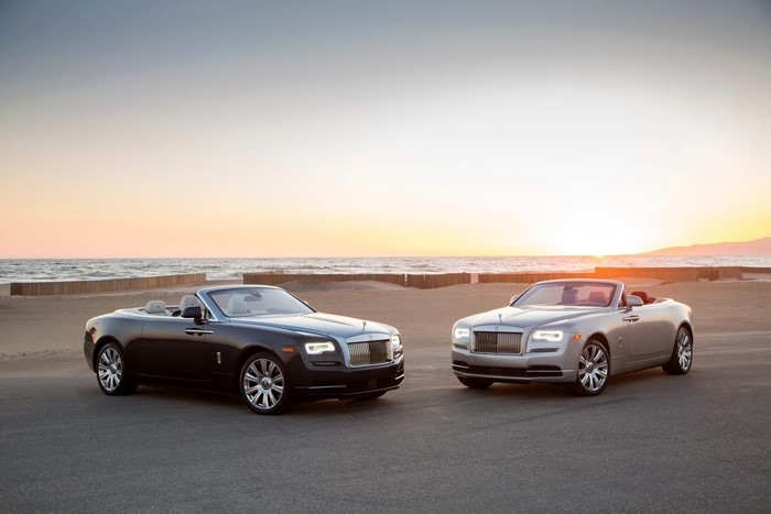 Two Rolls-Royce Dawn Cabriolets on Beach at Sunset