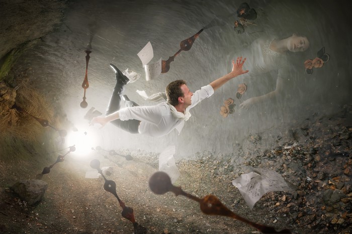 Man falling through time with ghostly woman