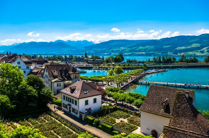 Rapperswil, Switzerland Houses on Lake with Mountains