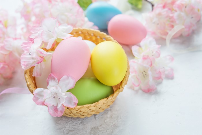 Easter Eggs in a Basket with Flowers