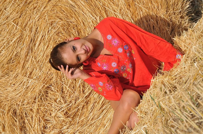 Irina J Lidija in a hay bale