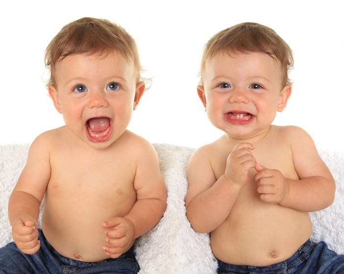 Two babies on a white background