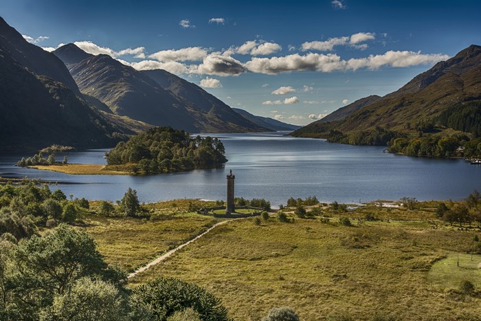 Glenfinnan Monument on a Loch in Scotland